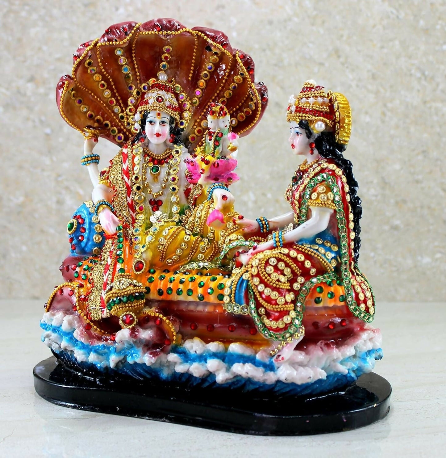 Beautiful Vishnu with Laxmi idol from the Esplanade collection, depicted in Ksheer Sagar with intricate details.