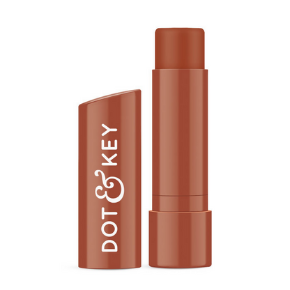 Dot & Key Barrier Repair Hydrating Lip Balm SPF 50 with cocoa nude color, ceramides, and peptides, shown in a sleek tube.