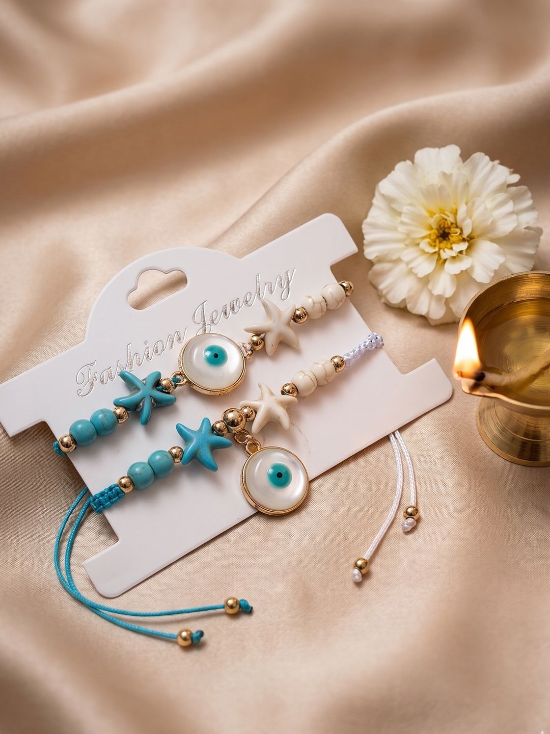 Anouk Set Of 2 Blue Evil Eye & White Pearl Bhaiya Bhabhi Rakhi With Roli Chawal Chandan