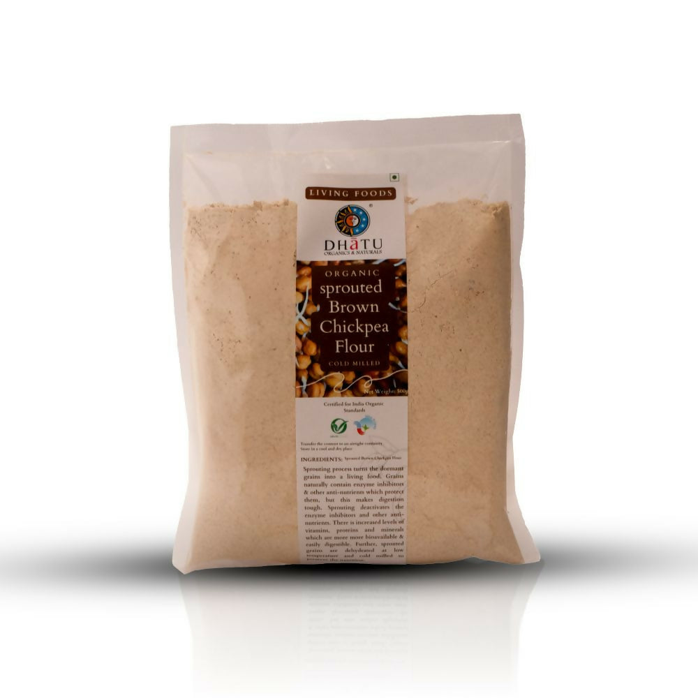 Organic sprouted brown chickpea flour by Dhatu Organics & Naturals, shown in a clear bowl on a rustic wooden surface.