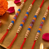 Dhiyona Set Of 4 Multicolor Circular Beads Studded Thread Rakhi With Roli Chawal Chandan
