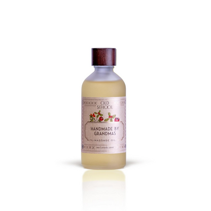 Old School Rituals handmade baby massage oil in a clear bottle, designed for gentle skin soothing and relaxation.
