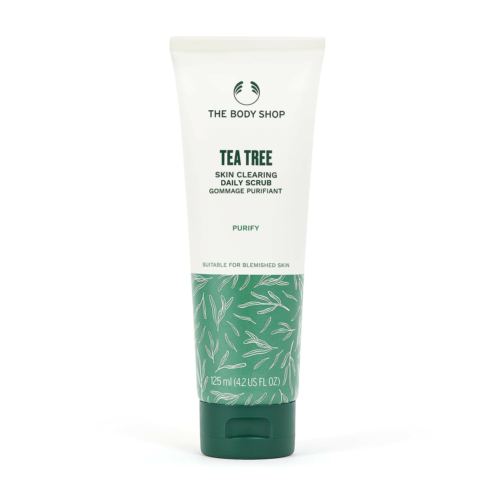 The Body Shop Tea Tree Skin Clearing Daily Scrub showing a tube of exfoliating scrub with tea tree extract and natural ingredients.