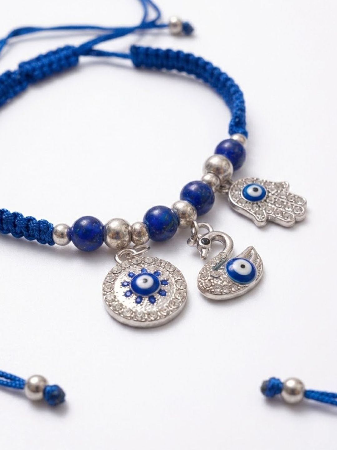 Anouk Set Of 2 Blue & Silver Evil Eye Design Bhaiya Bhabhi Rakhi With Roli Chawal Chandan