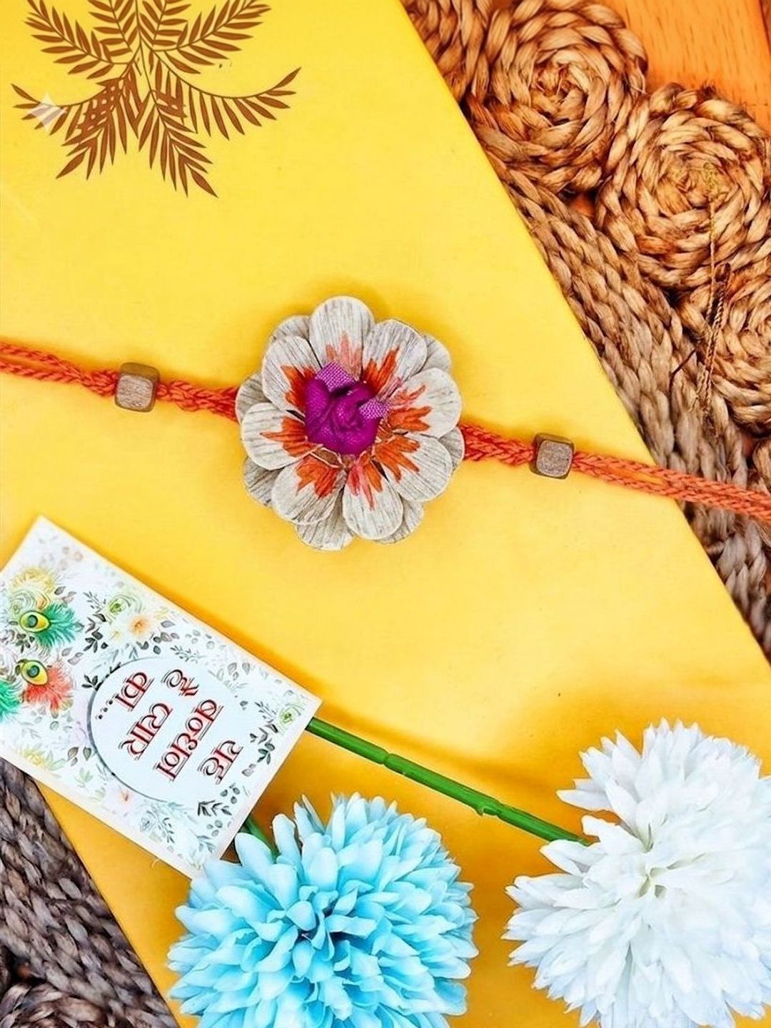 Anouk Multicolor Floral Design Plant Seed Rakhi With Roli Chawal Chandan Mishri