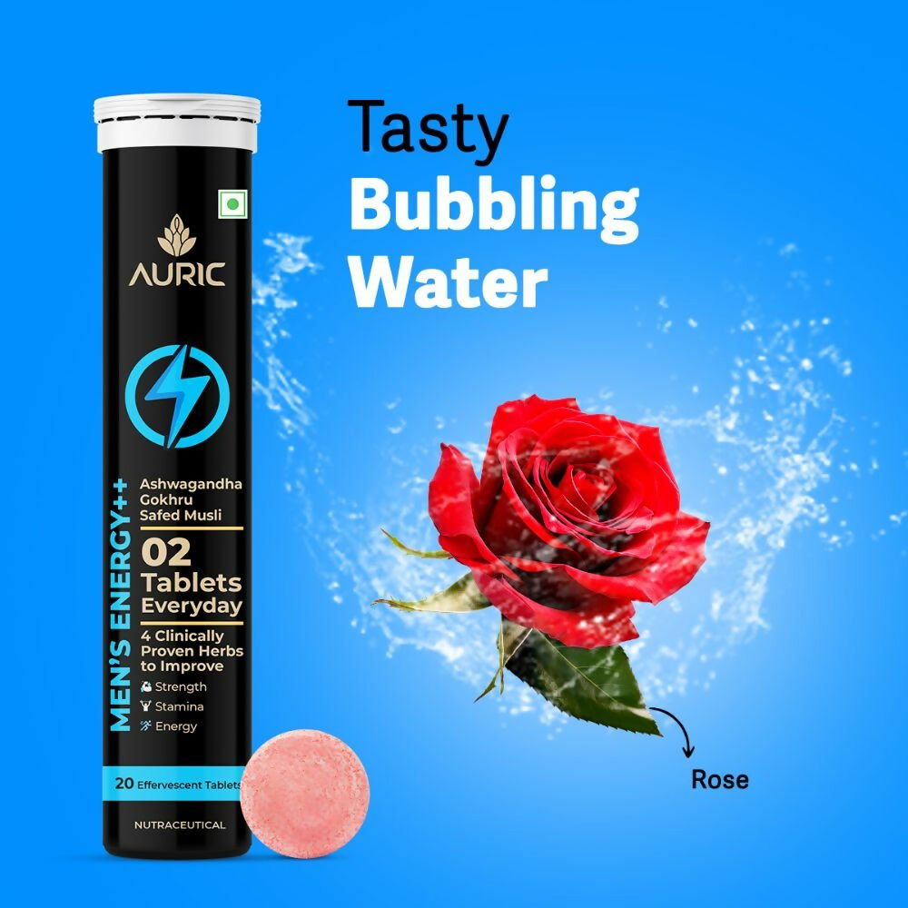 Auric Men's Energy++ Ayurvedic effervescent tablets in a transparent glass with tablets and a lemon slice.
