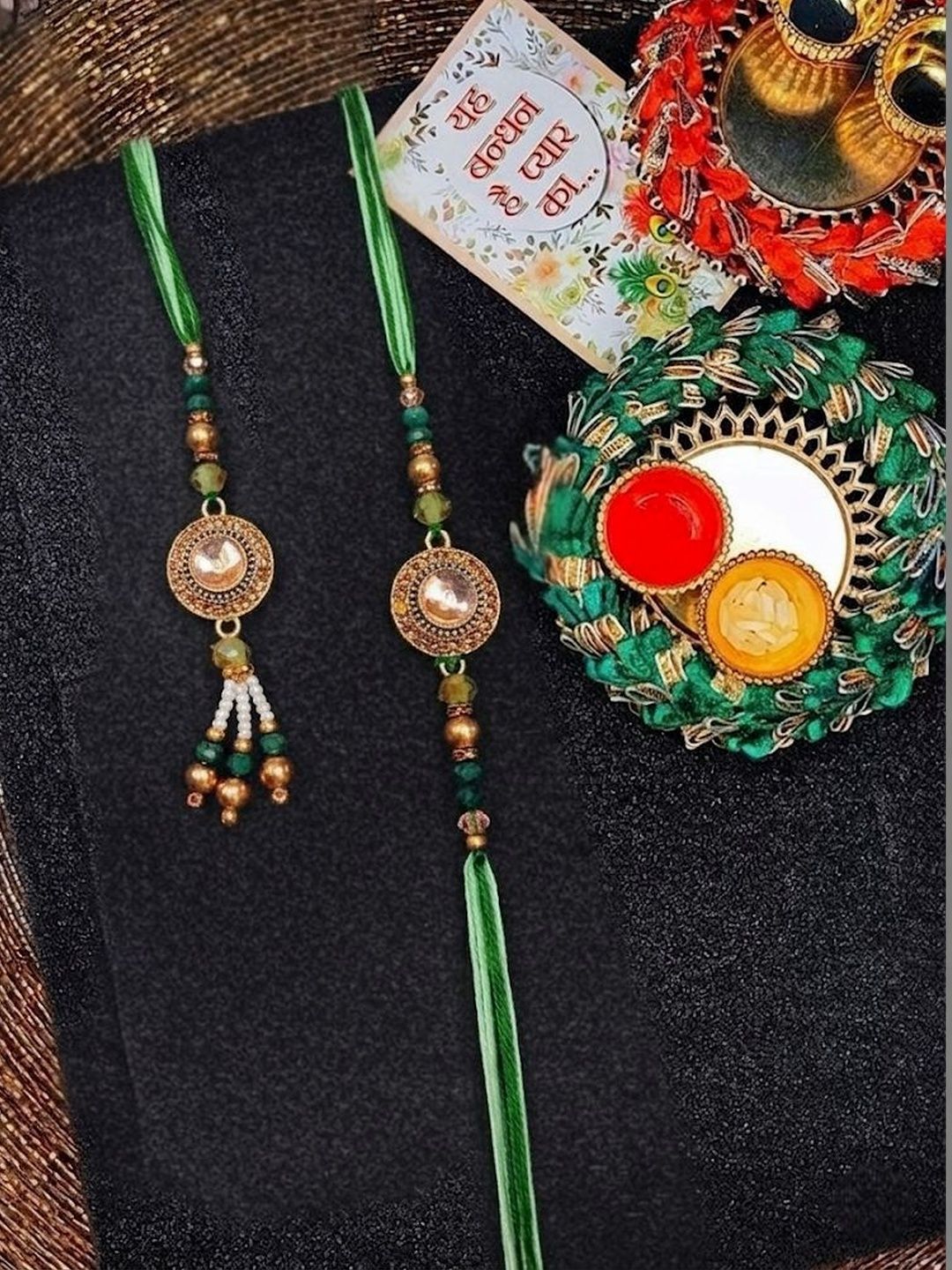 Anouk Set Of 2 Ad Drawstring Bhaiya Bhabhi Rakhi With Roli Chawal Chandan Mishri
