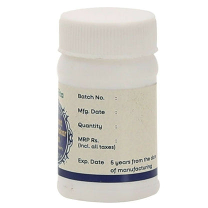 Amrita Ayurvedic tablets, Amrita Vasant Kusumakar Ras (Swarna Rahit), in a traditional glass bottle with labeled packaging.
