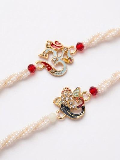 Dhiyona Set Of 2 White Pearls Om & Ganesh Ji Thread Rakhi With Roli Chawal Chandan Mishri