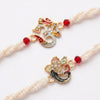 Dhiyona Set Of 2 White Pearls Om & Ganesh Ji Thread Rakhi With Roli Chawal Chandan Mishri