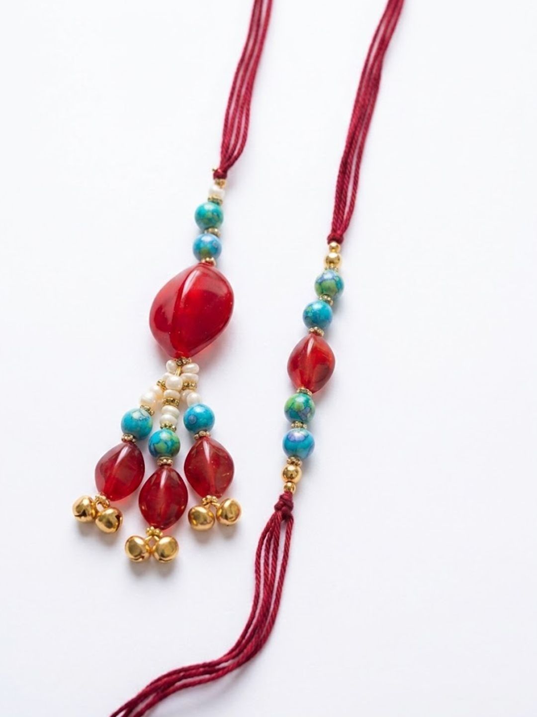 Anouk Set Of 2 Artificial Beads & Gold Toned Ghungroo Bhaiya Bhabhi Rakhi With Roli Chawal