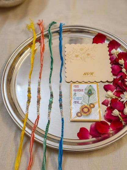 Anouk Set Of 4 Multicolor Artificial Beads Thread Rakhi With Roli Chawal Chandan Mishri