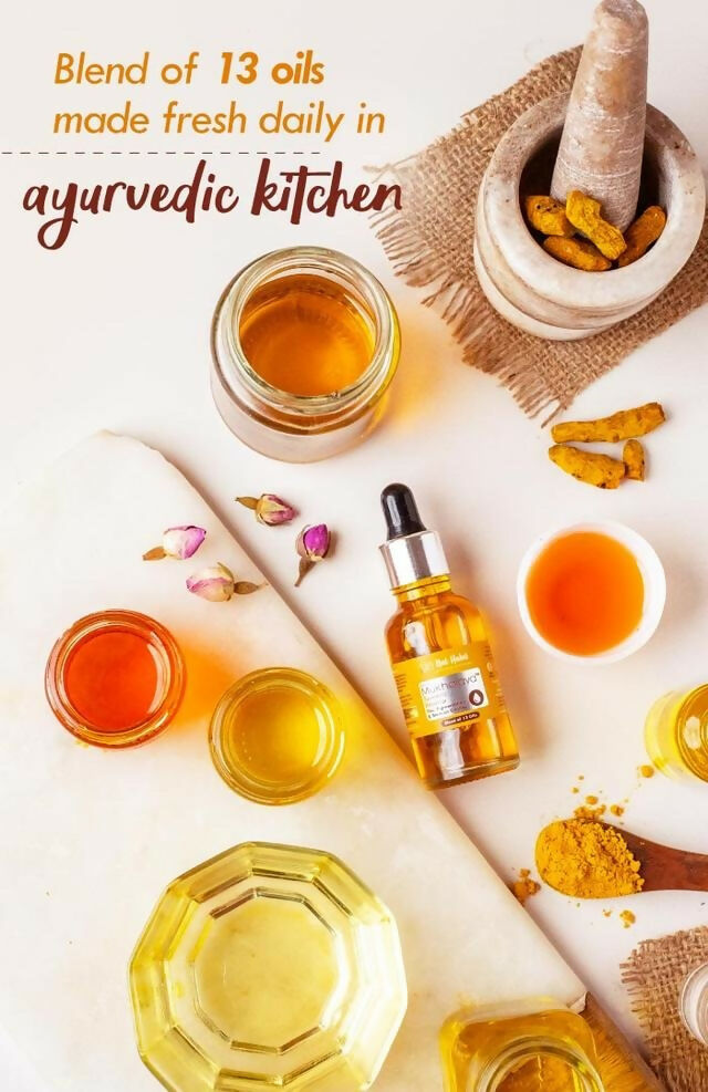 Nat Habit Pure Turmeric Rosehip Mukhalaya face oil bottle with dropper, showcasing natural ingredients and clear packaging.
