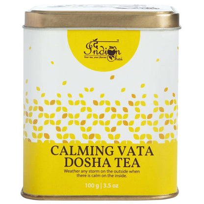 Indian Chai calming Vata Dosha tea powder in a jar with a spoon, showcasing traditional Indian tea blend and earthy spices.