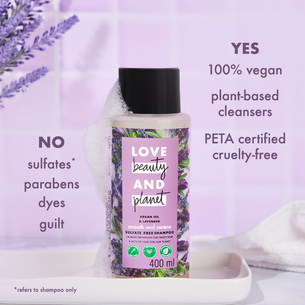 Love Beauty and Planet argan oil and lavender sulfate-free shampoo bottle for dry, frizzy hair in a sleek personal care setting.