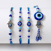 Dhiyona Set Of 4 Designer Blue Evil Eye Thread Rakhi With Roli Chawal Chandan Mishri