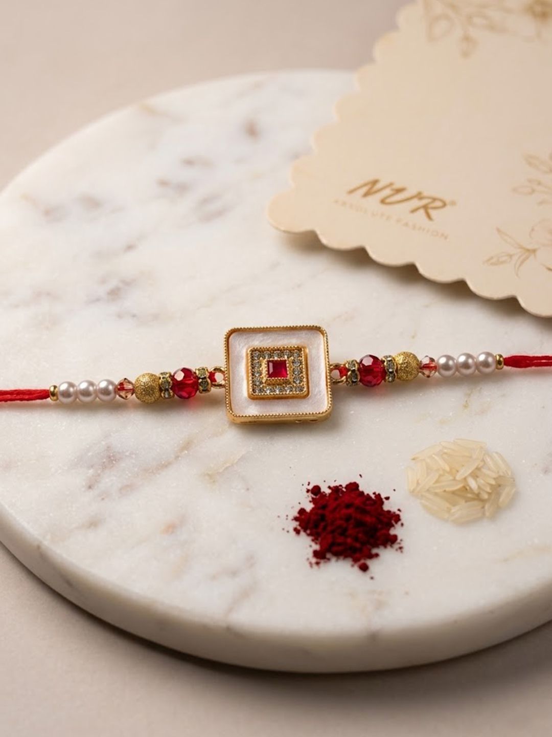 Anouk Square Design Multicolor Artificial Stones & Pearls Thread Rakhi With Roli Chawal