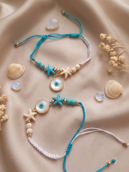 Anouk Set Of 2 Blue Evil Eye & White Pearl Bhaiya Bhabhi Rakhi With Roli Chawal Chandan