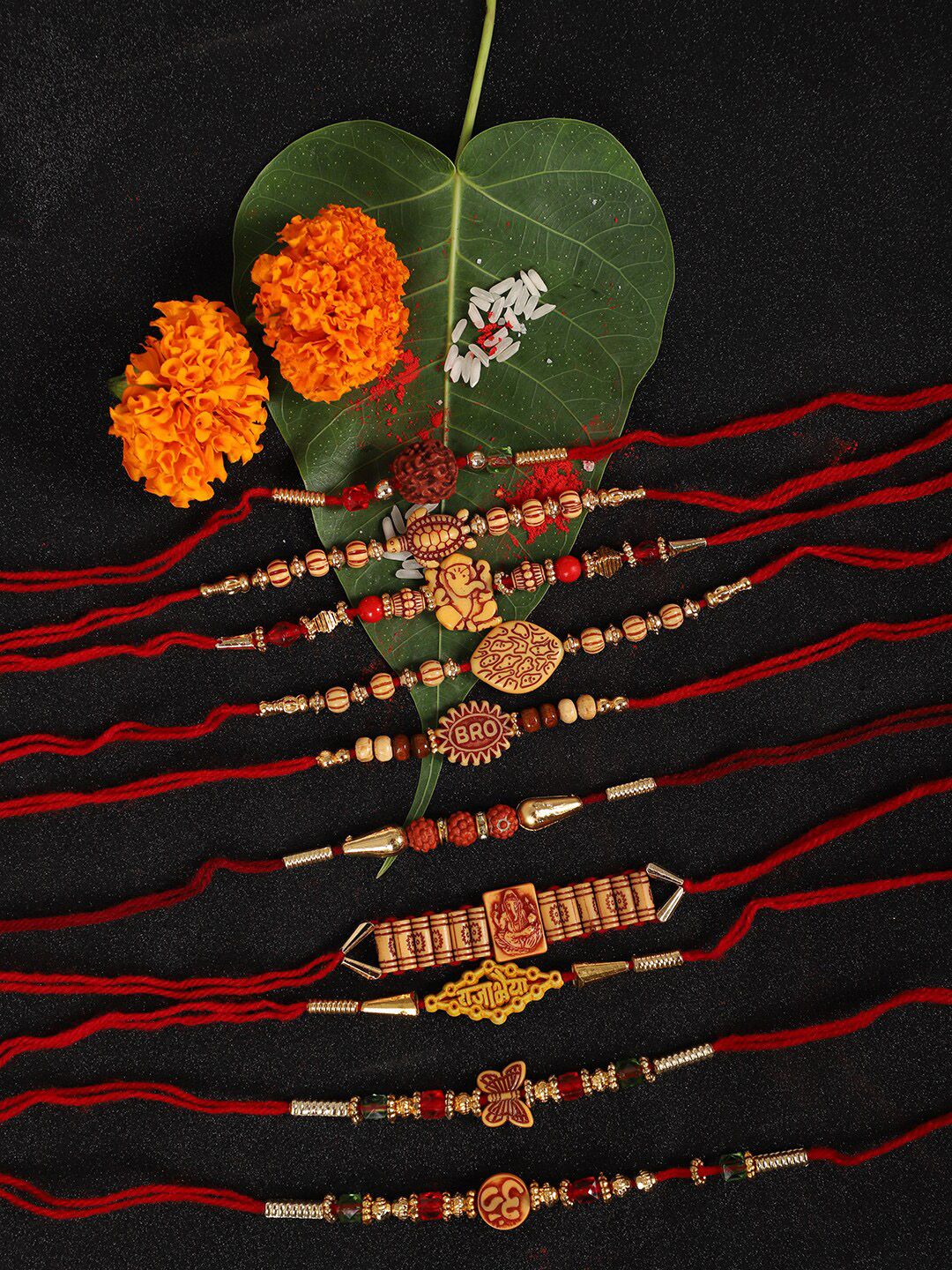 Anouk Red Set Of 10 Ganesha & Om Charm Rakhi