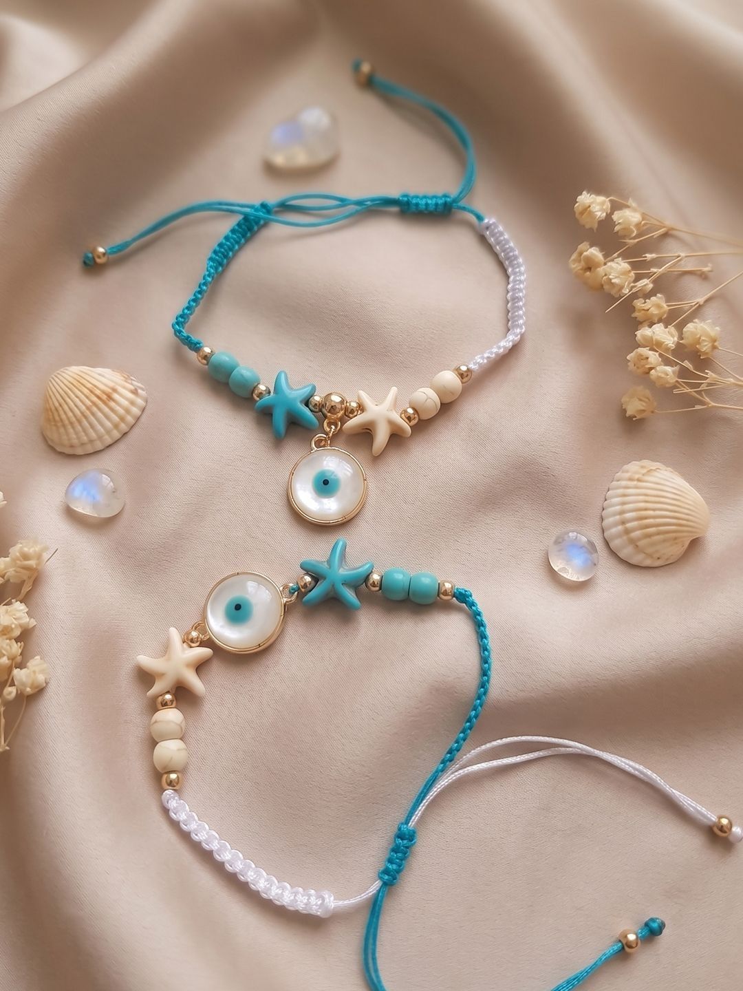 Anouk Set Of 2 Blue Evil Eye & White Pearl Bhaiya Bhabhi Rakhi With Roli Chawal Chandan