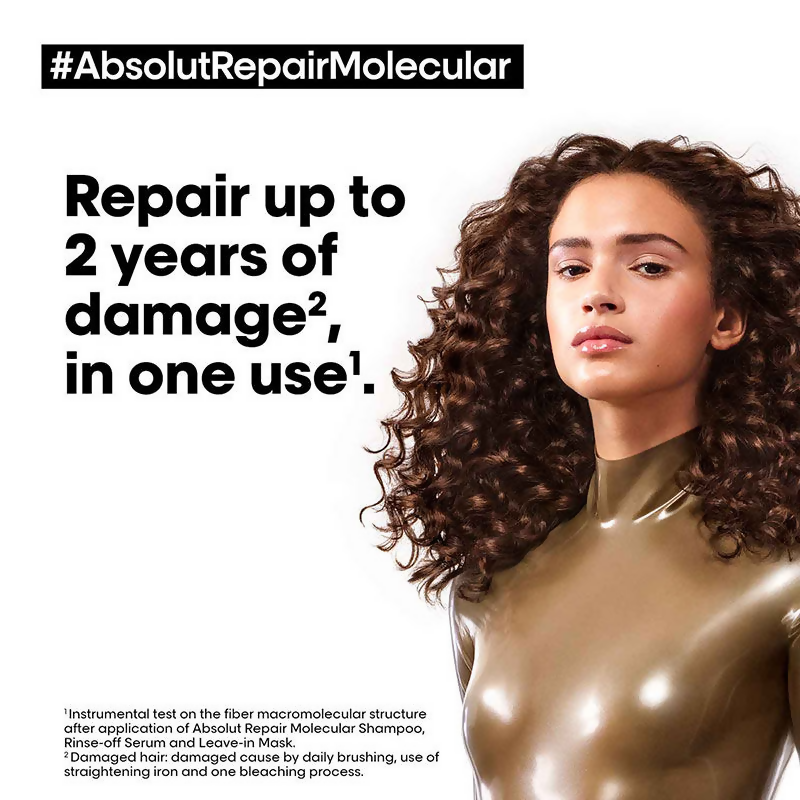 L'Oreal Paris Absolut Repair molecular shampoo, rinse-off serum, and leave-in mask for damaged hair, displayed together.