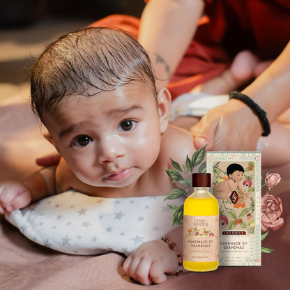 Old School Rituals handmade baby massage oil in a clear bottle, featuring a gentle, nourishing formula for infants.