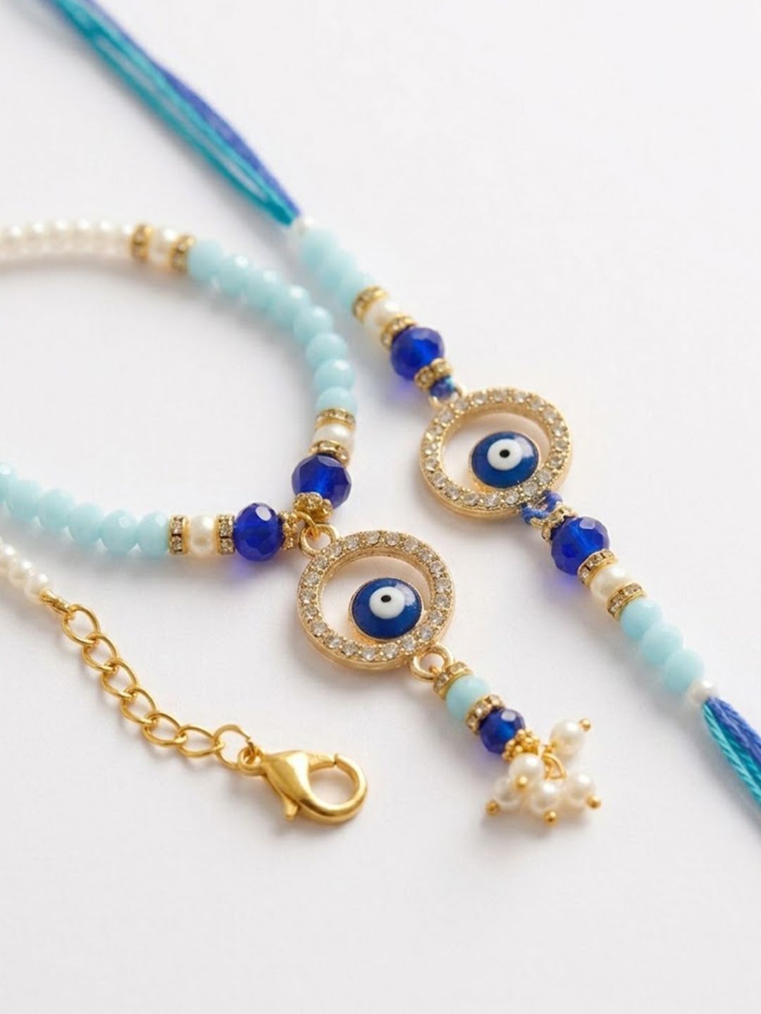 Anouk Set Of 2 Blue Evil Eye Gold Toned Beaded Bhaiya Bhabhi Rakhi