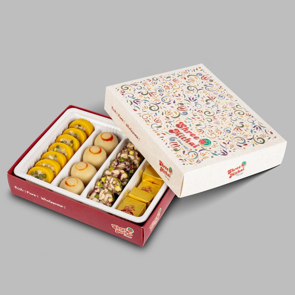 Assorted North Indian sweets from Shree Mithai, featuring colorful mercury-shaped desserts in a decorative presentation.