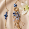 Dhiyona Set Of 2 Gold Toned Round Evil Eye Bhaiya Bhabhi Rakhi