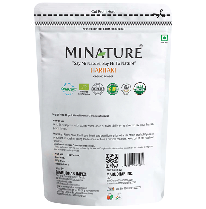 Organic Minature Haritaki powder in a jar, showcasing the fine, natural herbal Ayurvedic powder from Minature brand.