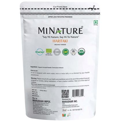 Organic Minature Haritaki powder in a jar, showcasing the fine, natural herbal Ayurvedic powder from Minature brand.