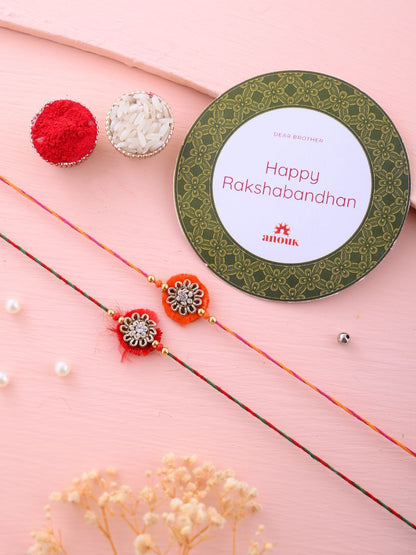 Anouk Set Of 2 Red Flower Design Stone Studded Rakhis Comes With Roli Rice & Greeting Card