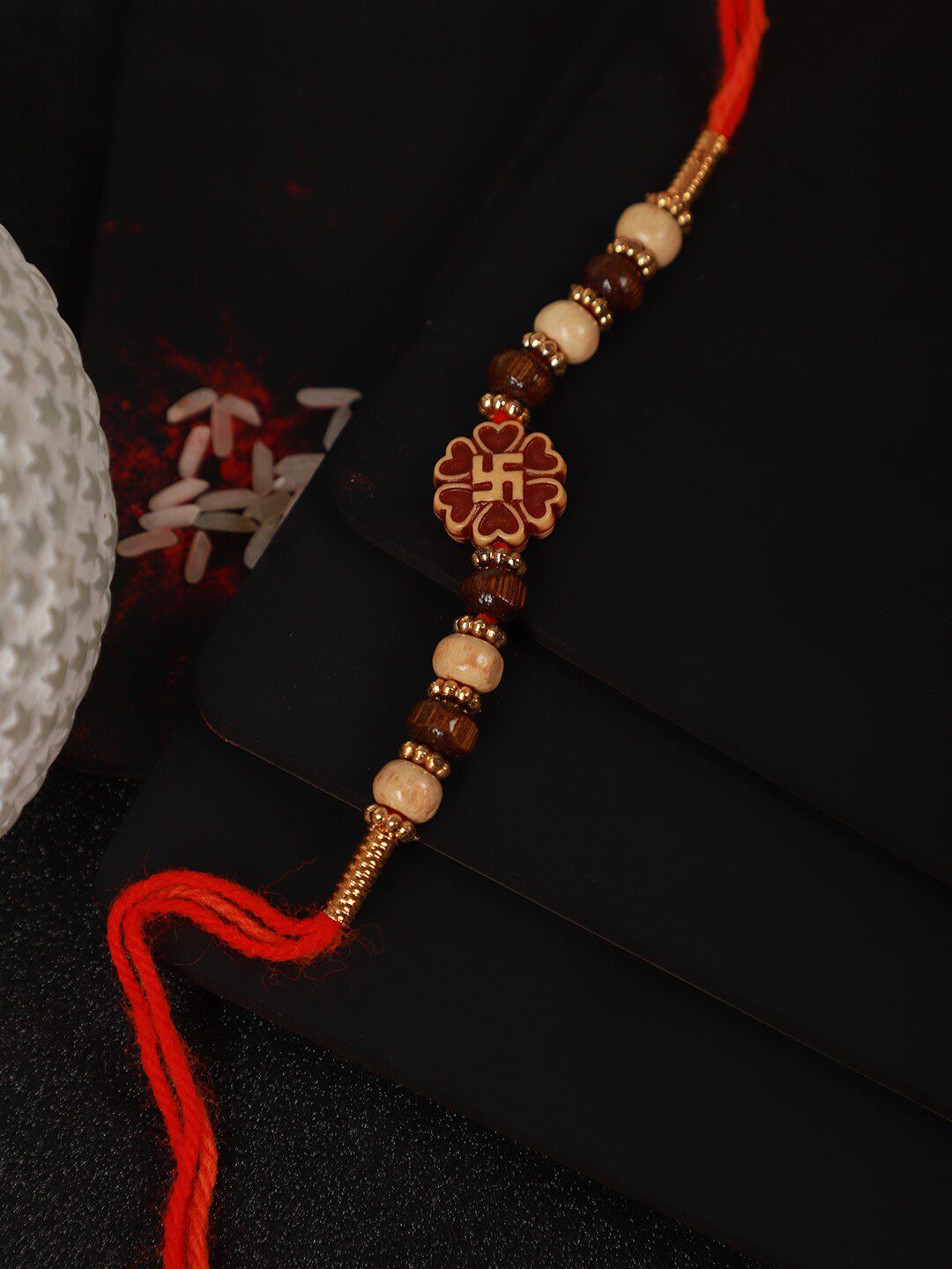 Anouk Unisex Red Swastik Charm & Beaded Rakhi With Roli Chawal & Greetings Card