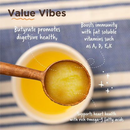 Organic grass-fed cow ghee from Two Brothers Organic Farms, made from Gir cow A2 milk, in a glass jar.