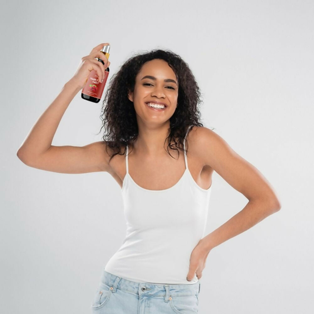 Ivory Natural hair spray for long hair, showing a woman with shiny, healthy long hair, emphasizing hair growth and strength.