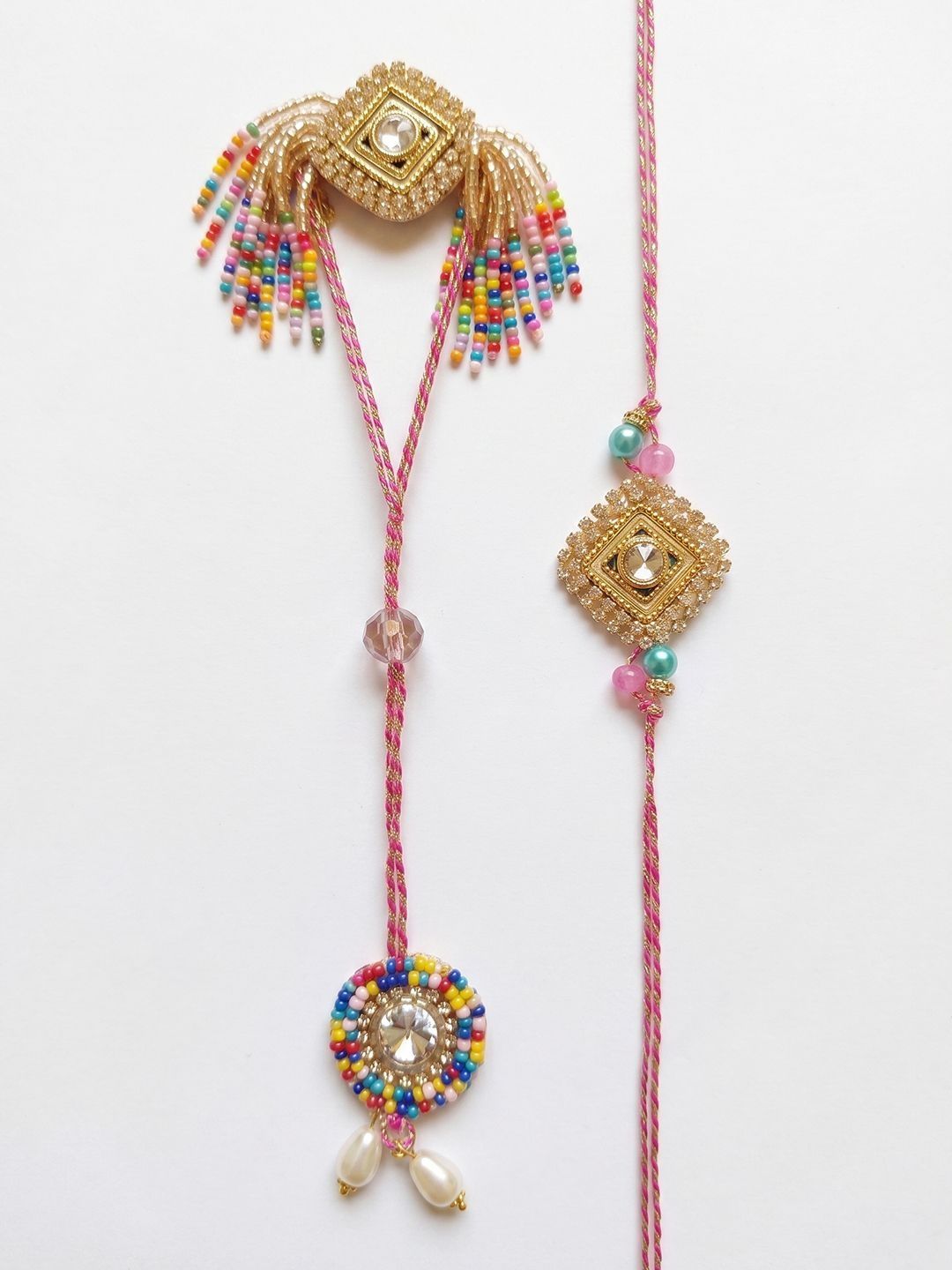 Anouk Set Of 2 White Artificial Stones Golden Toned Bhaiya Bhabhi Rakhi With Roli Chawal