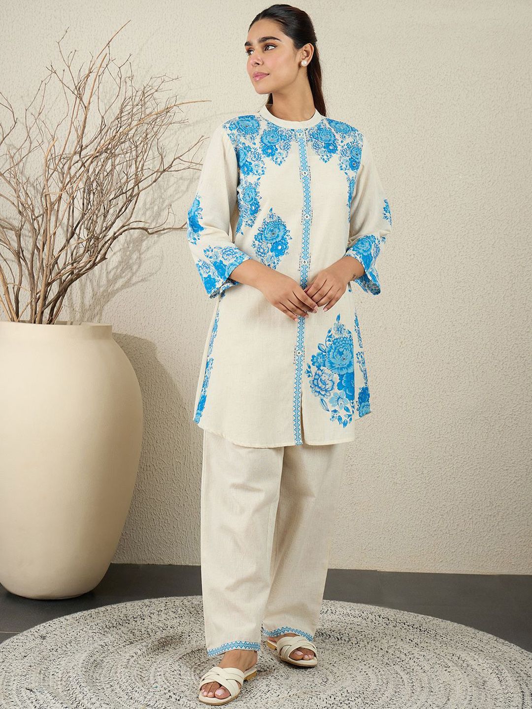 Women Floral Printed Cotton Kurta with Trousers