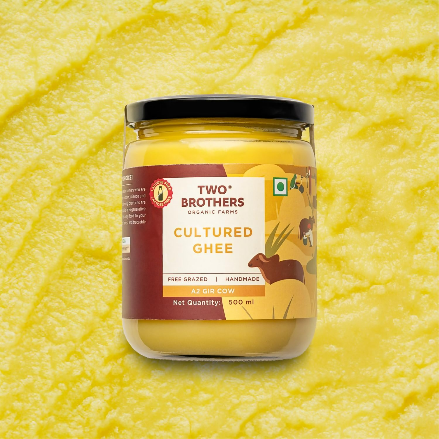 Two Brothers Organic Farms organic A2 cow ghee butter made from grass-fed Gir cows in a clear jar.