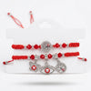 Dhiyona Set Of 2 Red & Silver Evil Eye Design Bhaiya Bhabhi Rakhi With Roli Chawal Chandan