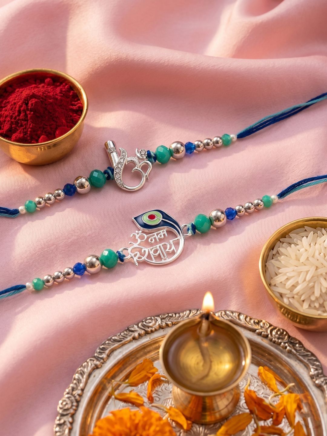 Anouk Set Of 2 Silver Toned Beaded Religious Thread Rakhi With Roli Chawal Chandan Mishri