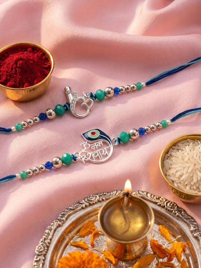 Indyancart Set Of 2 Silver Toned Beaded Religious Thread Rakhi With Roli Chawal Chandan Mishri