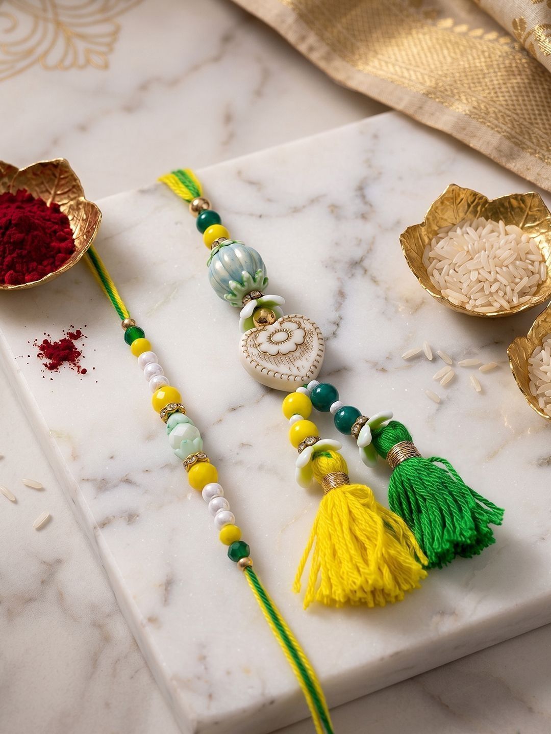 Anouk Set Of 2 Green & Yellow Beaded Heart Shape Bhaiya Bhabhi Rakhi With Roli Chawal