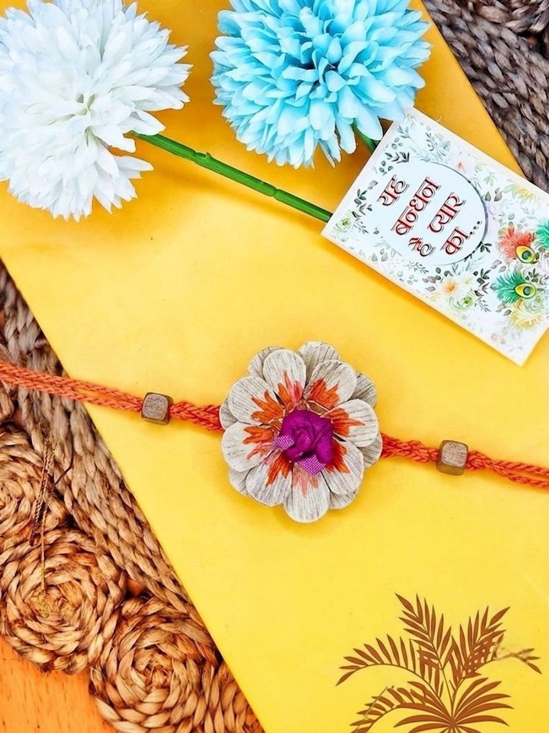 Anouk Multicolor Floral Design Plant Seed Rakhi With Roli Chawal Chandan Mishri