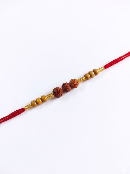 Anouk Religious Rudraksh & Red Thread Rakhi With Roli Chawal Chandan Mishri
