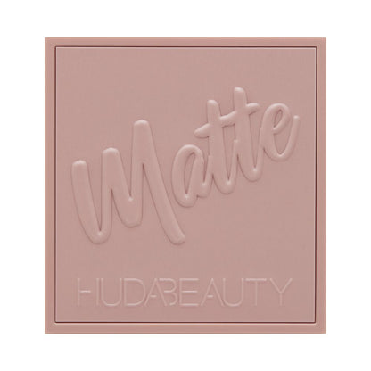 Huda Beauty Matte Obsessions Cool Eyeshadow Palette with various matte shades in a compact palette for eye makeup.