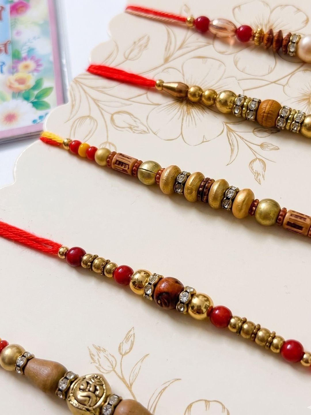Anouk Set Of 5 Multicolor Designer Thread Rakhi With Roli Chawal Chandan Mishri