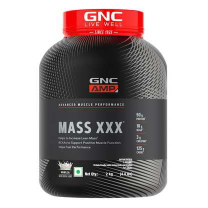 GNC AMP XXX Mass Gainer Ayurvedic protein powder in vanilla flavor, showing the container with scoop and powder inside.