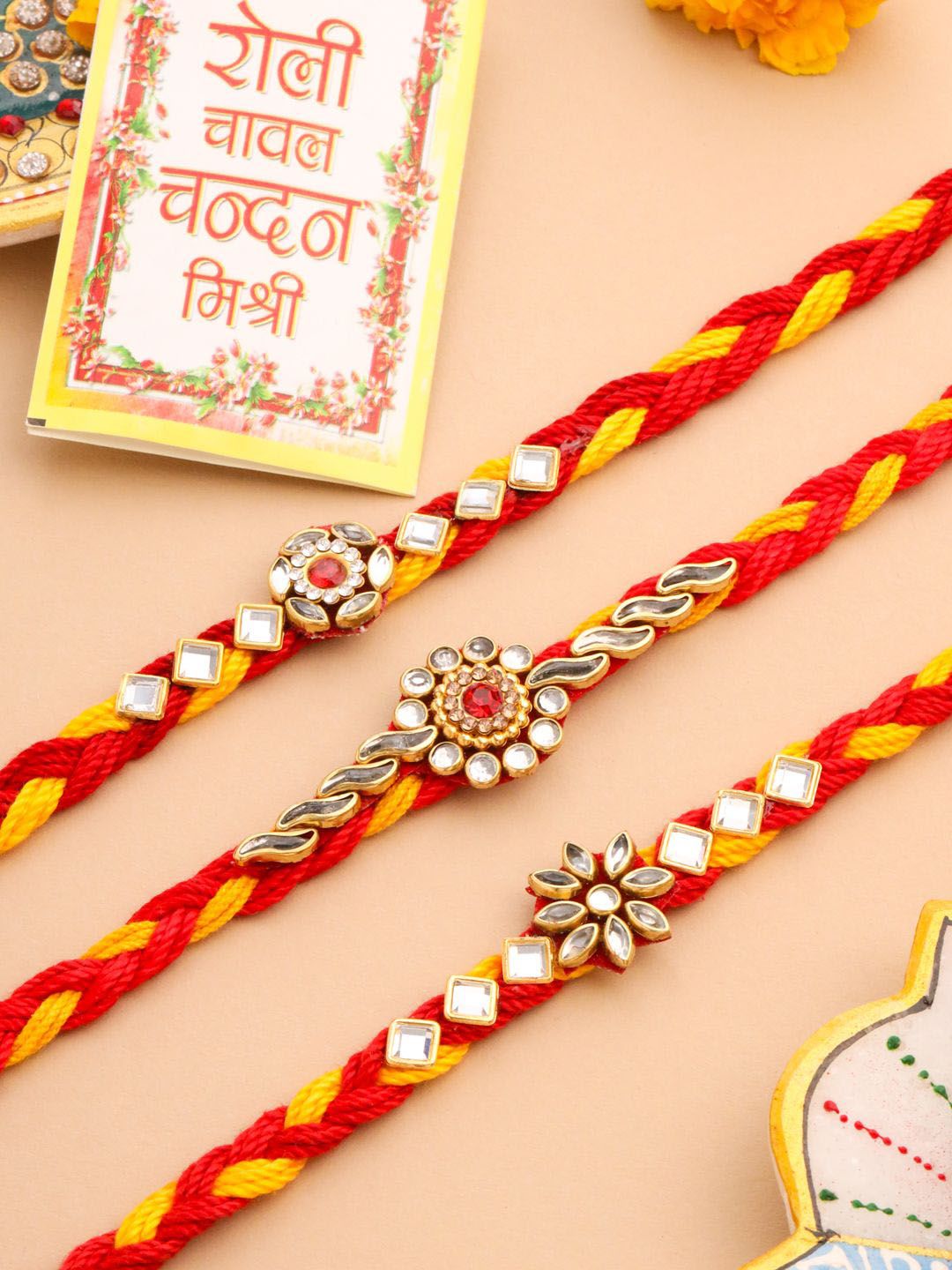 Anouk Men Set Of 3 Red & Yellow Kundan Studded Floral Design Thread Rakhi With Roli Chawal