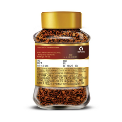 Tata Coffee Gold Original instant coffee jar with coffee powder visible, showcasing the brand's premium pure coffee.