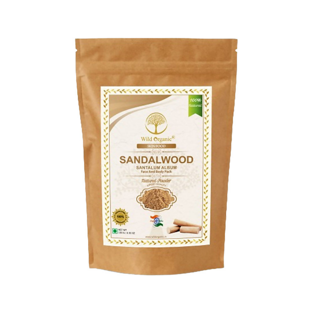 Wild Organic sandalwood powder face and body pack in a jar, used for skin brightening and natural skincare.